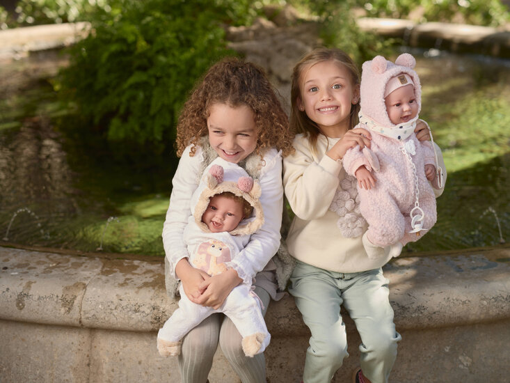 Kinderen met Smiling baby pop Tala